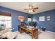 Charming home office with a ceiling fan, natural light, and ample desk space at 425 Cottonseed Way, Durham, NC 27703
