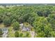 Aerial view of the property with lush surroundings at 436 Madison Ave, Princeton, NC 27569
