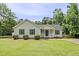Charming one-story home with a well-manicured lawn and inviting front porch at 436 Madison Ave, Princeton, NC 27569