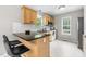 Charming kitchen featuring granite countertops, stainless steel appliances, and backsplash at 436 Madison Ave, Princeton, NC 27569