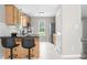 Well-lit kitchen with stainless steel appliances, granite countertops, and ample cabinet space at 436 Madison Ave, Princeton, NC 27569