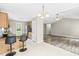 Open kitchen with eat-in counter and view into the living room at 436 Madison Ave, Princeton, NC 27569