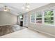 Bright living room featuring fireplace, natural light, and access to the outdoors at 436 Madison Ave, Princeton, NC 27569