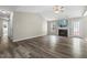 Bright living room featuring a fireplace, wood floors, and lots of space at 436 Madison Ave, Princeton, NC 27569
