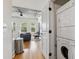 Open-concept living area with lots of natural light and in-unit laundry at 444 S Blount St # 209, Raleigh, NC 27601