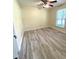 Comfortable bedroom with a ceiling fan and natural light, providing a cozy and inviting atmosphere at 5 Sue Ann Ct, Durham, NC 27704