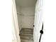Well-organized walk-in closet with ample shelving and storage space, offering practicality and convenience at 5 Sue Ann Ct, Durham, NC 27704