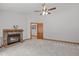 Inviting bedroom with a stone fireplace, neutral carpeting, and a cozy atmosphere at 502 Hillcrest Rd, Apex, NC 27502