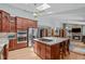 Open kitchen with a large island, stainless appliances, and easy access to living areas at 502 Hillcrest Rd, Apex, NC 27502