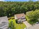Aerial view of a two-story home with a spacious backyard in a desirable neighborhood at 504 Ashburn Ln, Durham, NC 27703