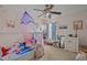 Charming bedroom featuring a canopy bed, plush toys, and stylish decor at 504 Ashburn Ln, Durham, NC 27703