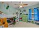 Fun bedroom with bunk bed, ceiling fan, and unique decor at 504 Ashburn Ln, Durham, NC 27703