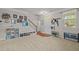 Inviting living room with neutral carpet, white trim and access to the front door at 504 Ashburn Ln, Durham, NC 27703