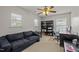 Bright office space with a comfortable sofa, desk, and ample natural light at 504 Ashburn Ln, Durham, NC 27703
