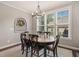 The dining room includes a view from the large window at 508 Morning Oaks Dr, Holly Springs, NC 27540