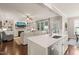 Bright, open kitchen flows into the living room, creating a perfect space for entertaining at 508 Morning Oaks Dr, Holly Springs, NC 27540