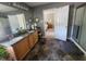 Bathroom has double vanity, large mirror, a walk-in shower, and a doorway to the bedroom at 5126 Thornton Knoll Way, Raleigh, NC 27616