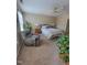 Spacious carpeted bedroom with recliner, and lots of natural light at 5126 Thornton Knoll Way, Raleigh, NC 27616