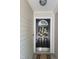A black front door with a wreath and a keypad lock provides a secure entry at 5126 Thornton Knoll Way, Raleigh, NC 27616