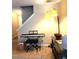 Living room area showcasing a piano and stylish furnishings at 5126 Thornton Knoll Way, Raleigh, NC 27616
