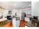 Modern kitchen with stainless steel appliances, granite countertops, and a breakfast bar at 513 Dragby Ln, Raleigh, NC 27603