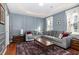 Comfortable living room with stylish decor, soft lighting, and a large sectional sofa at 513 Dragby Ln, Raleigh, NC 27603