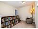 Reading loft with bookshelves and comfortable armchair, perfect for relaxing and reading at 513 Dragby Ln, Raleigh, NC 27603