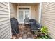 Charming patio with a comfortable lounge set, perfect for relaxing outdoors at 513 Dragby Ln, Raleigh, NC 27603