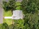 Aerial shot of backyard with a home, patio, grill, and perimeter fence at 5801 Hadrian Dr, Durham, NC 27703