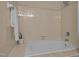 Tiled bathroom with a tub and shower combination at 5801 Hadrian Dr, Durham, NC 27703