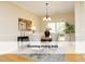 Dining room with stylish chandelier, modern table set at 603 Red Cedar Cir, Durham, NC 27712