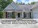 Charming single-story home with stone accents, black shutters, and inviting front porch at 603 Red Cedar Cir, Durham, NC 27712