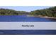 Picturesque view of the nearby lake and serene natural surroundings at 603 Red Cedar Cir, Durham, NC 27712