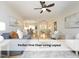 Open-concept living room with modern furnishings and hardwood floors throughout at 603 Red Cedar Cir, Durham, NC 27712