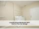 Convenient mudroom/laundry room with washer, dryer, and shelving, plus access to the two-car garage at 603 Red Cedar Cir, Durham, NC 27712