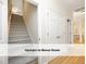 Staircase leading to a bonus room, next to an interior hall and closet at 603 Red Cedar Cir, Durham, NC 27712