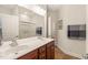 Bathroom featuring double sinks, tile floor and walk-in shower at 610 Mixboro Dr, Cary, NC 27519