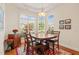 Cozy dining room with natural light, with an area rug, and views of the neighborhood at 610 Mixboro Dr, Cary, NC 27519