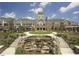 Beautiful community center featuring a clock tower, manicured landscaping and water feature at 610 Mixboro Dr, Cary, NC 27519