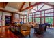 Elegant lounge area with high ceilings, large windows and comfortable seating arrangements at 610 Mixboro Dr, Cary, NC 27519