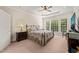 Serene main bedroom with trey ceiling, carpet, and large windows offering lots of light at 610 Mixboro Dr, Cary, NC 27519