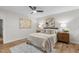 Bedroom featuring neutral paint, ceiling fan, and hardwood floors at 6129 Krandon Dr, Raleigh, NC 27603