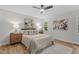 Cozy bedroom featuring neutral paint, ceiling fan, and hardwood floors at 6129 Krandon Dr, Raleigh, NC 27603