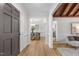 Inviting foyer with wood floors leading to dining room at 6129 Krandon Dr, Raleigh, NC 27603