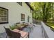 Comfortable deck includes plentiful seating and access to the house at 6817 Guess Rd, Hillsborough, NC 27278