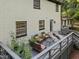 Inviting home featuring a large back deck perfect for entertaining, with a view of the serene wooded surroundings at 6817 Guess Rd, Hillsborough, NC 27278
