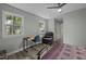 Well-lit bedroom with a desk, chair, and recliner, offering a comfortable and functional space at 6817 Guess Rd, Hillsborough, NC 27278