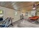 Versatile bonus room with wood ceiling, vinyl floors and lots of natural light at 6817 Guess Rd, Hillsborough, NC 27278
