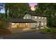 Charming two-story home featuring a covered carport and inviting entrance at 6817 Guess Rd, Hillsborough, NC 27278
