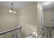 Upstairs hallway with updated vinyl floors and lots of natural light at 6817 Guess Rd, Hillsborough, NC 27278